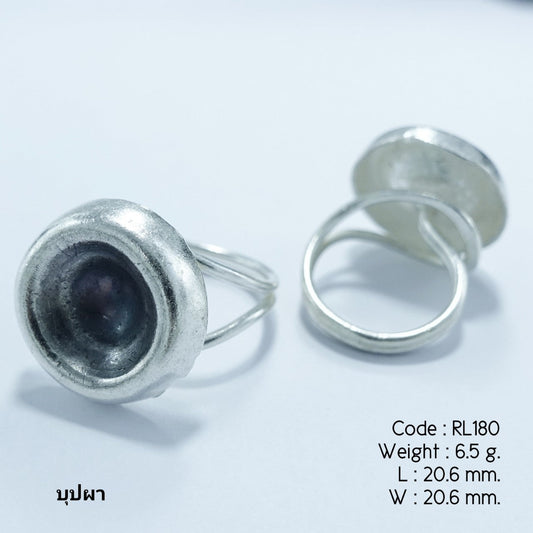 Hand-carved petals, one unique silver ring.