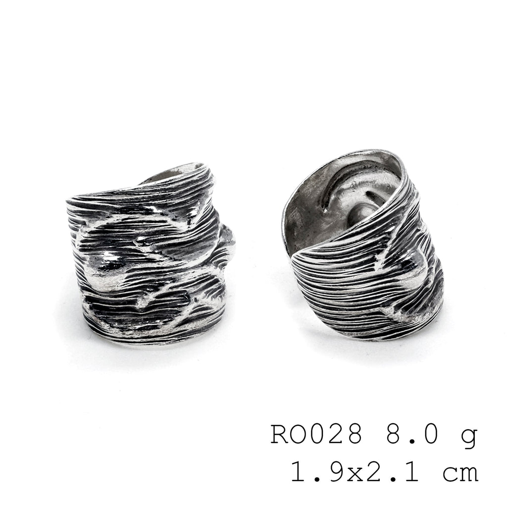 Uniquely yours, this hand-carved silver ring.