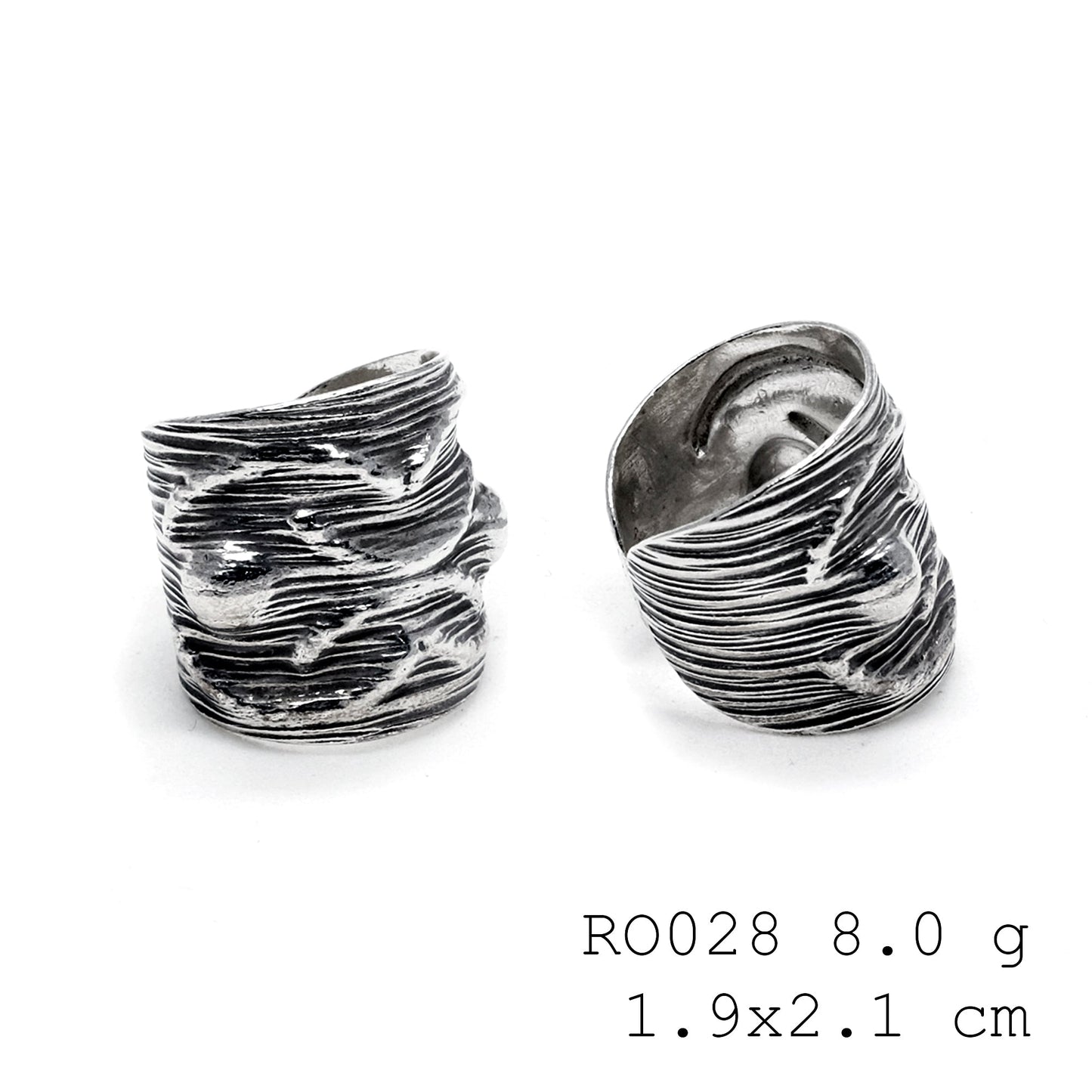 Uniquely yours, this hand-carved silver ring.