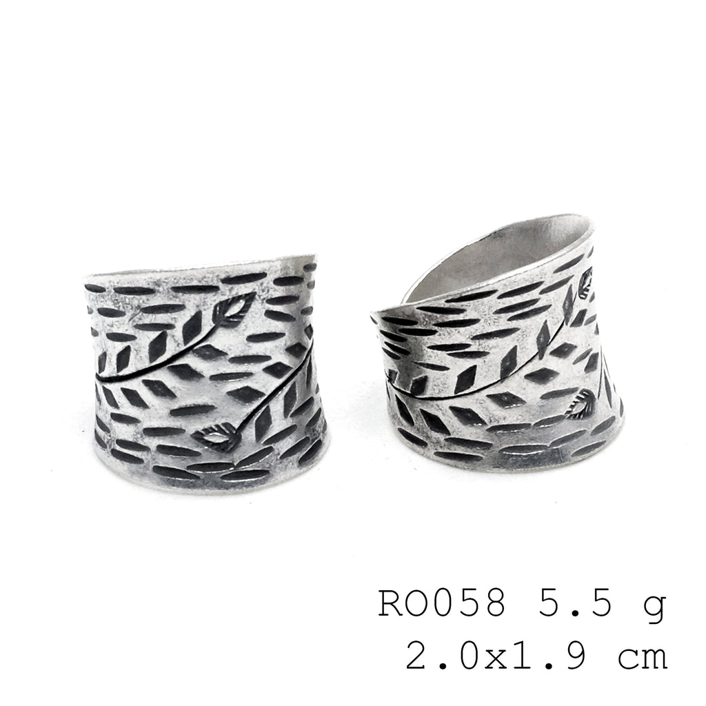 The artisan’s signature silver ring.