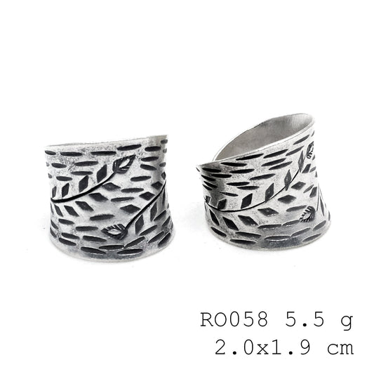 The artisan’s signature silver ring.
