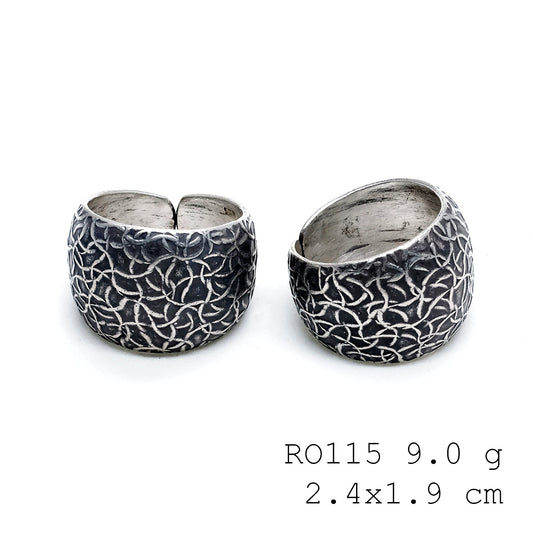 Carved by hand, worn with pride: a silver ring.