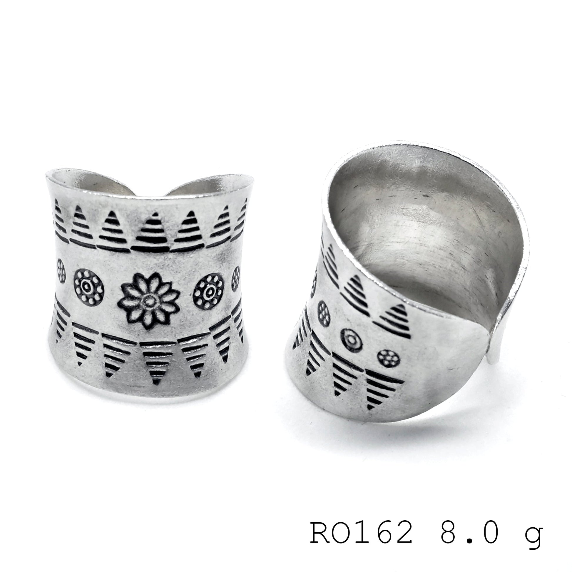 Authentic textures on a handmade silver ring.