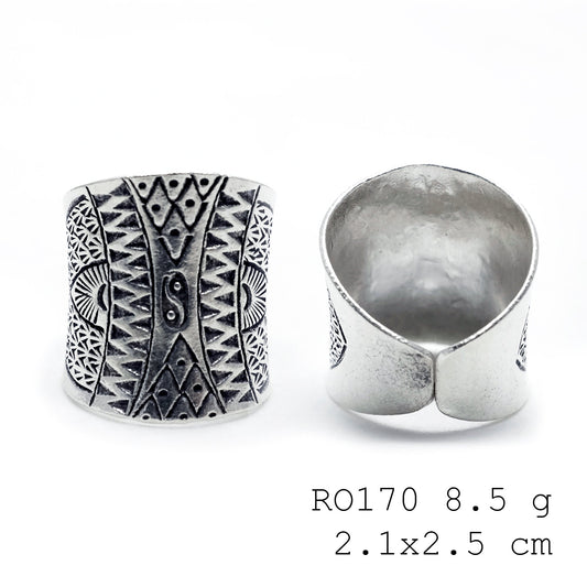 Refined carving for a timeless silver ring.