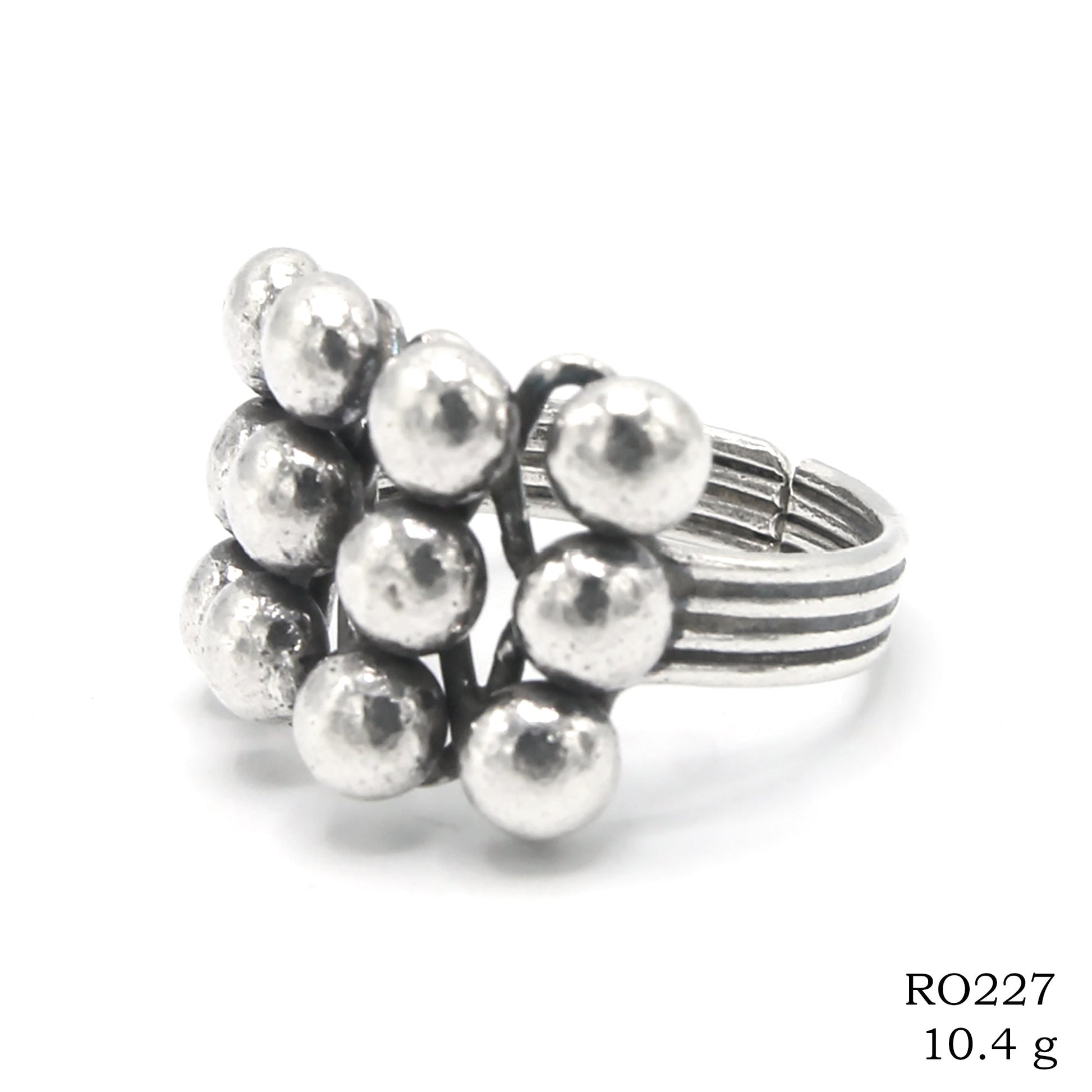 Silver stories in a carved silver ring.