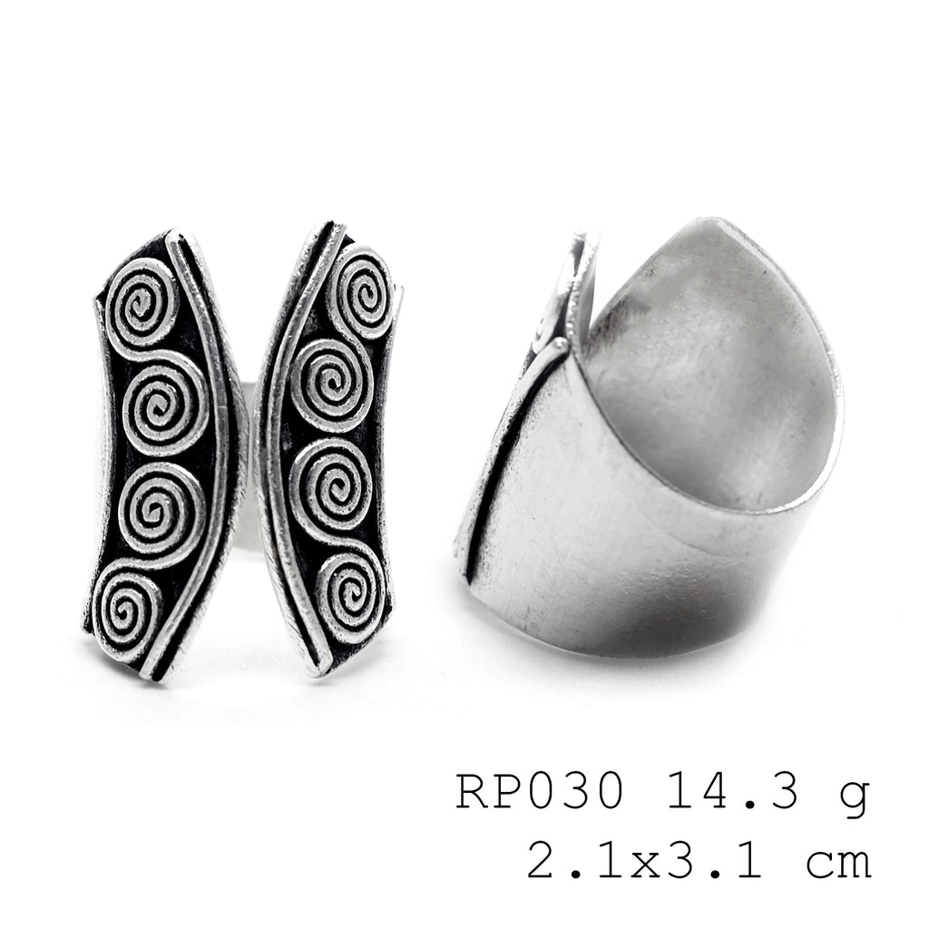 Masterfully pure. A front-open, handmade silver ring.