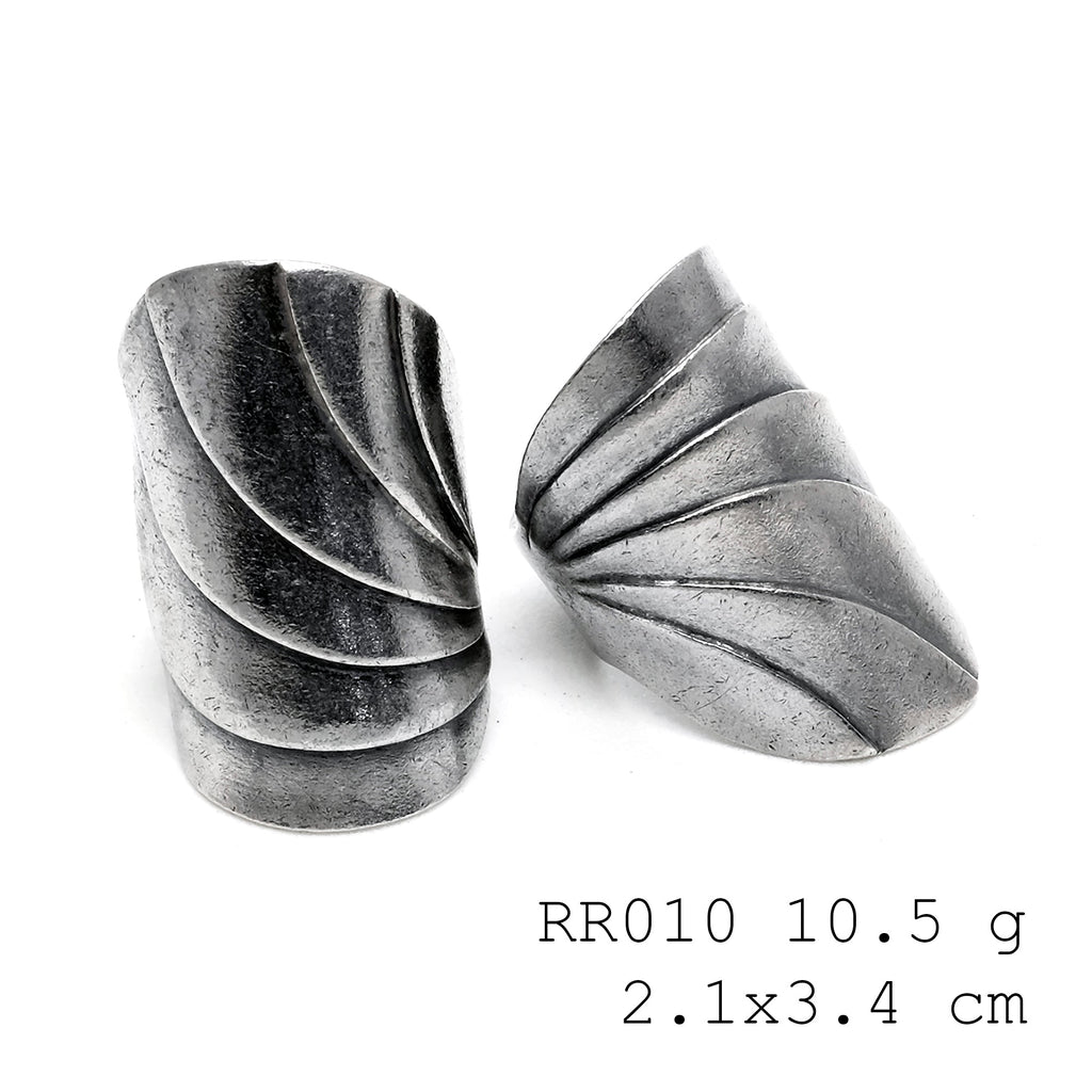 Simply 98% pure. A side-open silver ring.