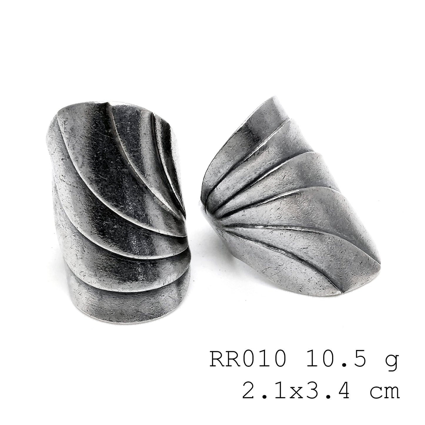 Simply 98% pure. A side-open silver ring.