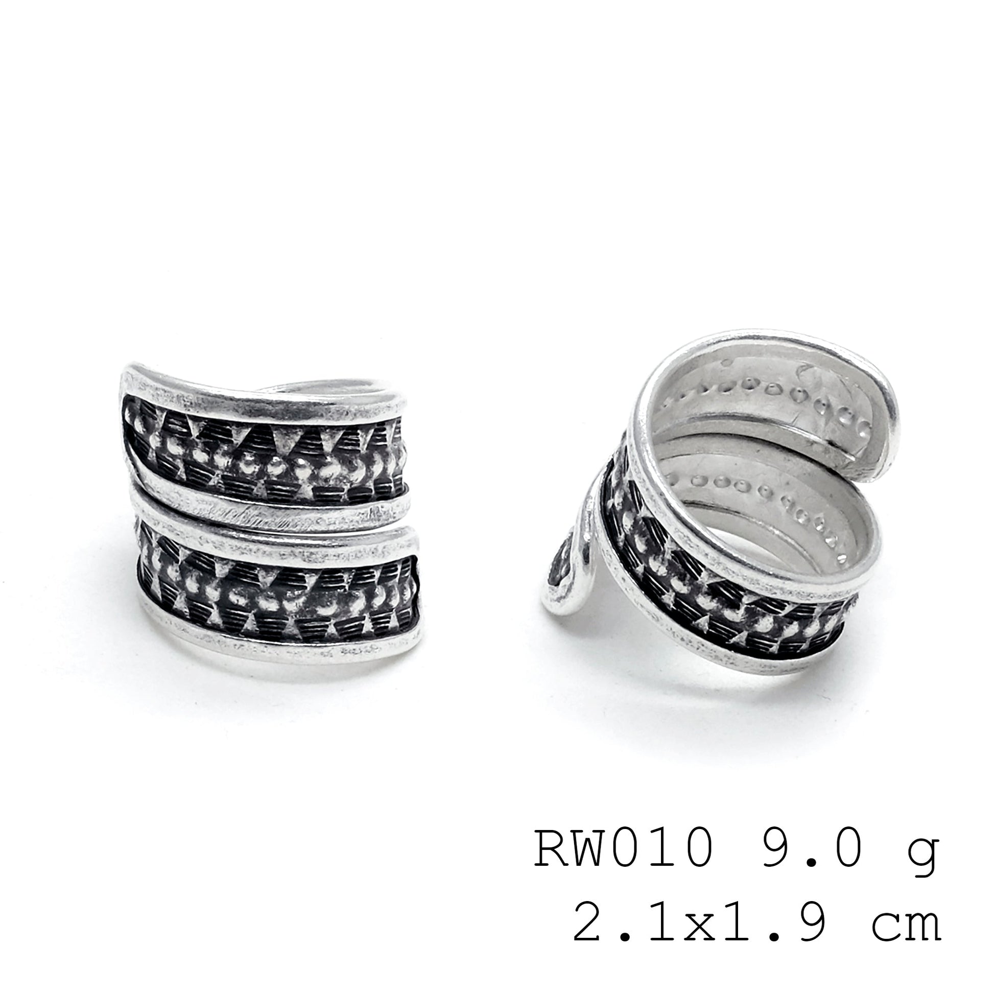 Hand-forged cross. A 98% pure silver ring.