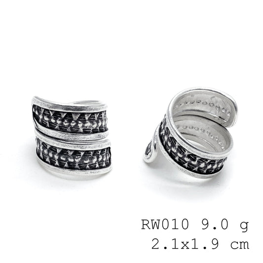Hand-forged cross. A 98% pure silver ring.