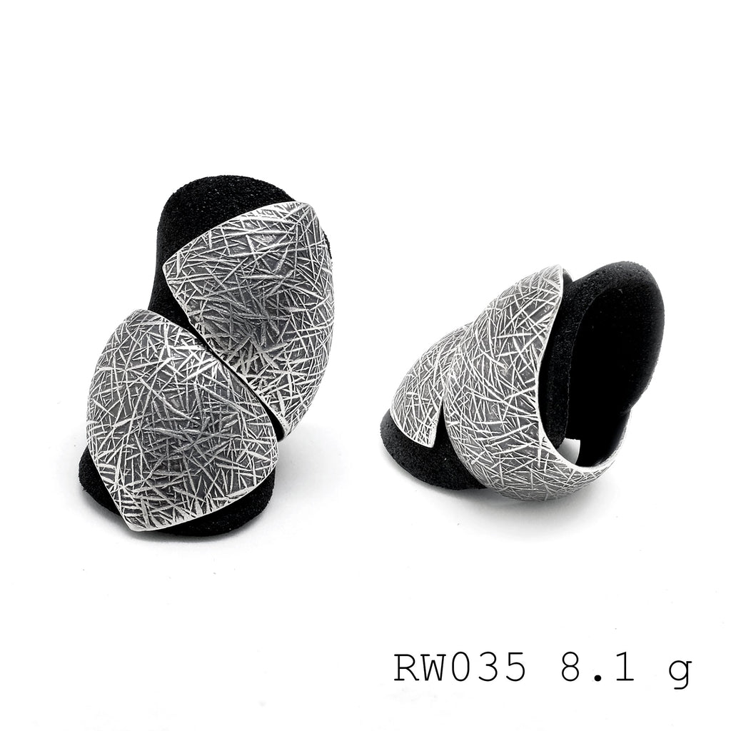 Statement cross. A handmade 98% silver ring.