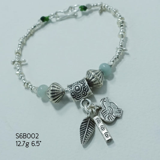 Elevate your style with our stunning silver bracelet.