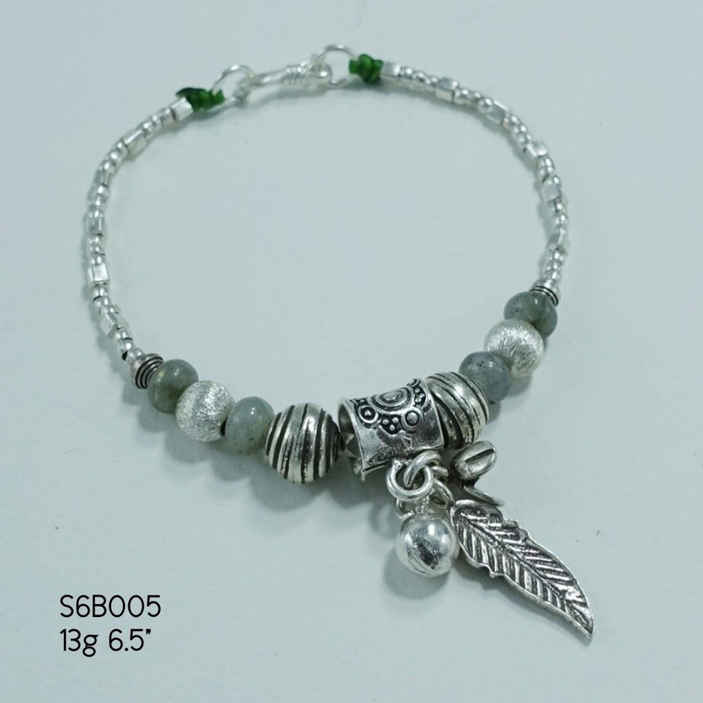 Classic meets chic in our handcrafted silver bracelet.