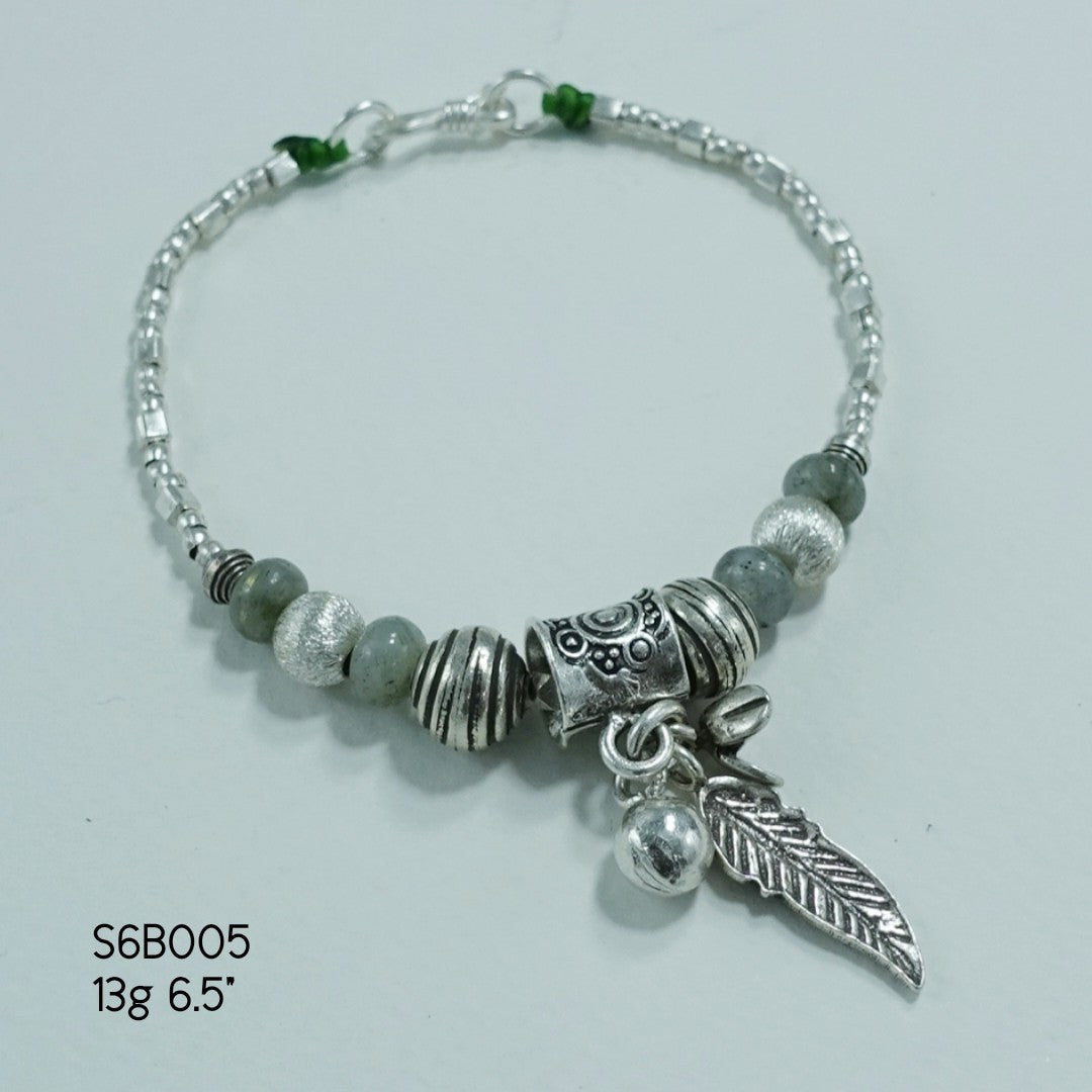 Classic meets chic in our handcrafted silver bracelet.