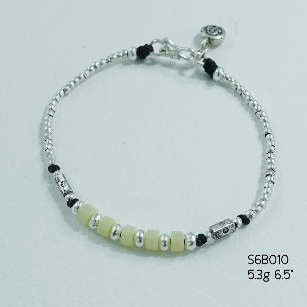 Make your wrist sparkle with our signature silver bracelet.