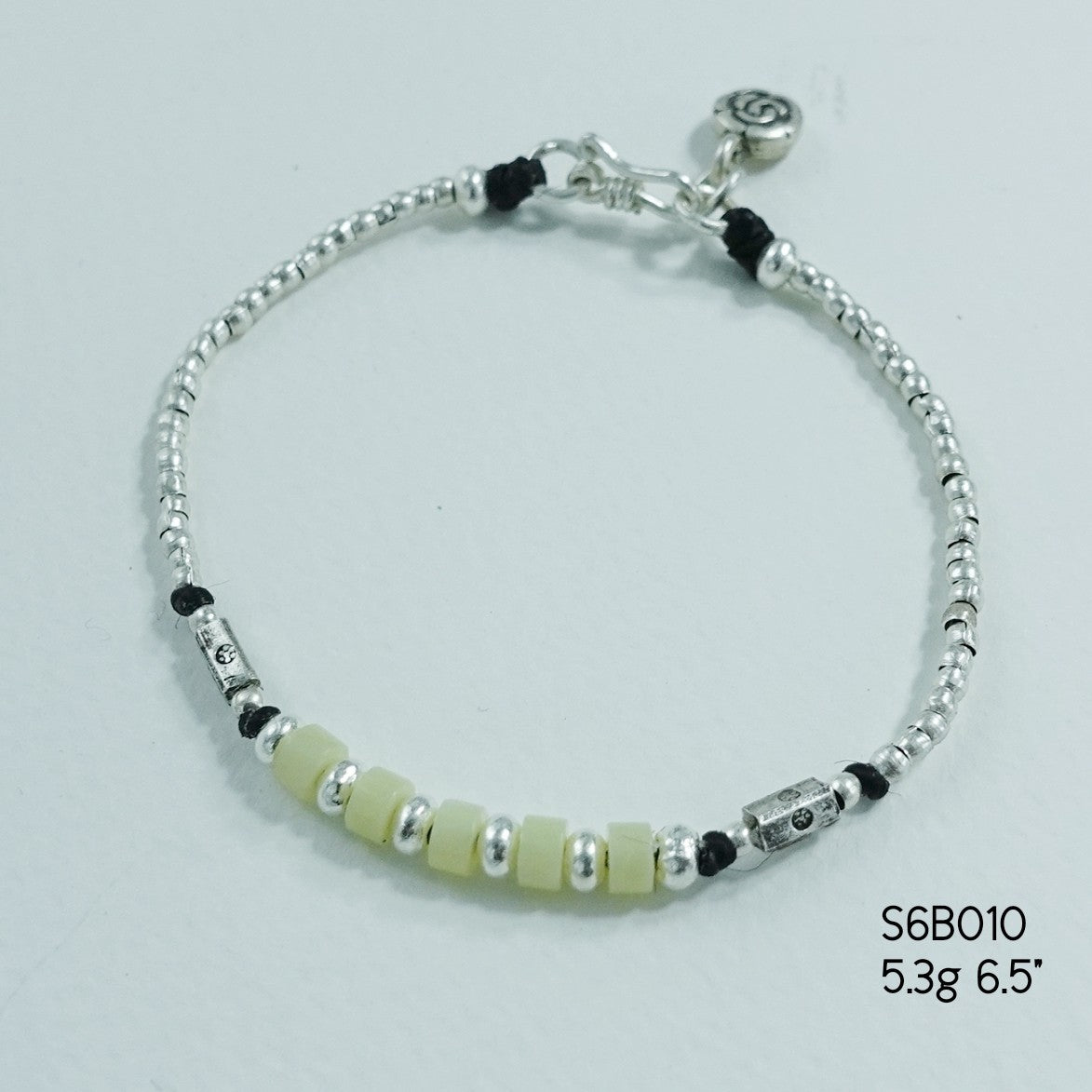 Make your wrist sparkle with our signature silver bracelet.