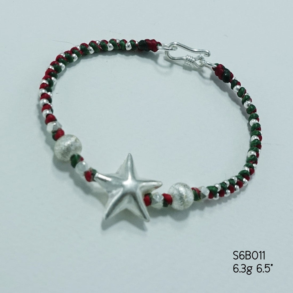 A silver bracelet that blends elegance and everyday charm.