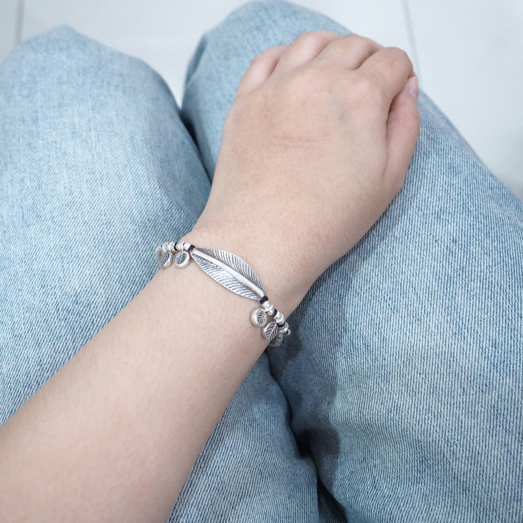 That perfect finishing touch: silver bracelet magic.