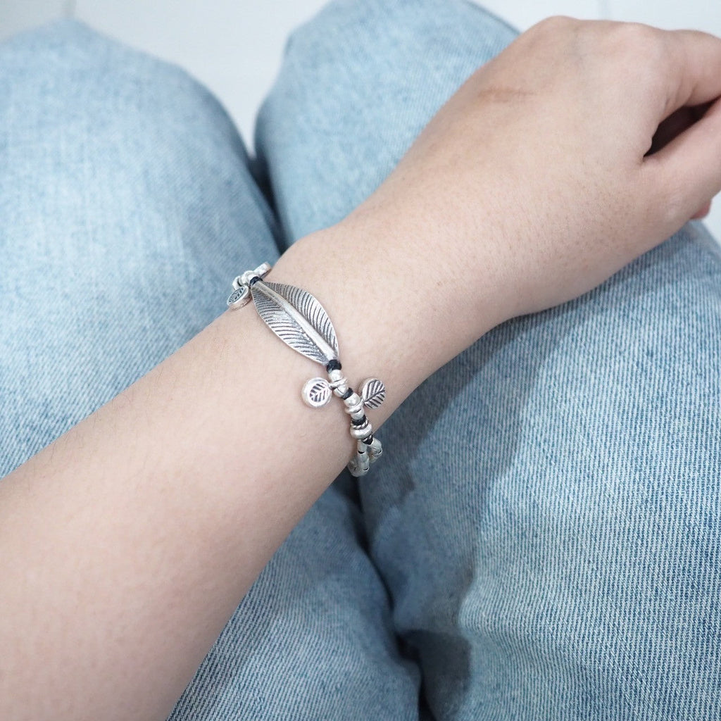 That perfect finishing touch: silver bracelet magic.