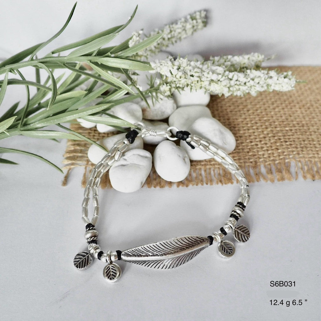 That perfect finishing touch: silver bracelet magic.