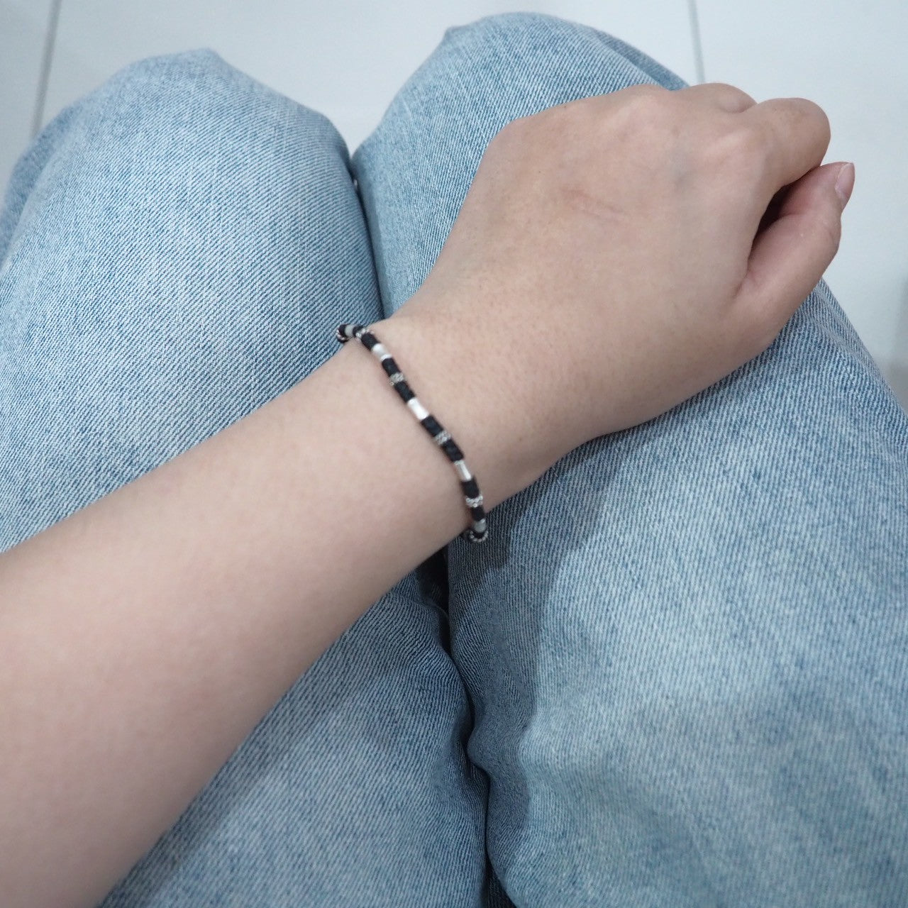 Make a statement with this unique silver bracelet.