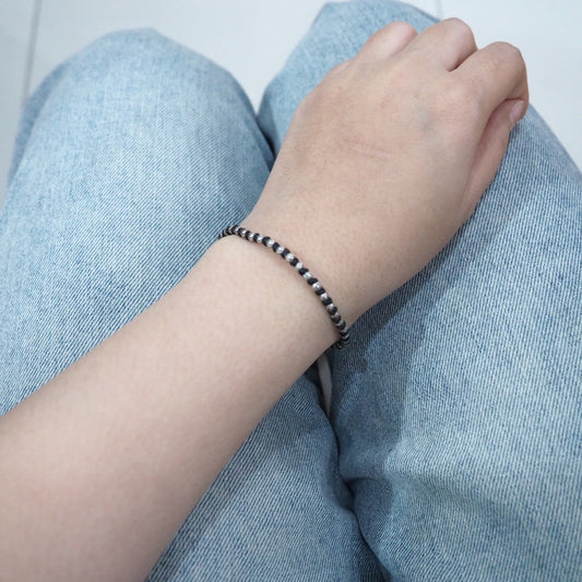 Instant classic. This silver bracelet never fades.