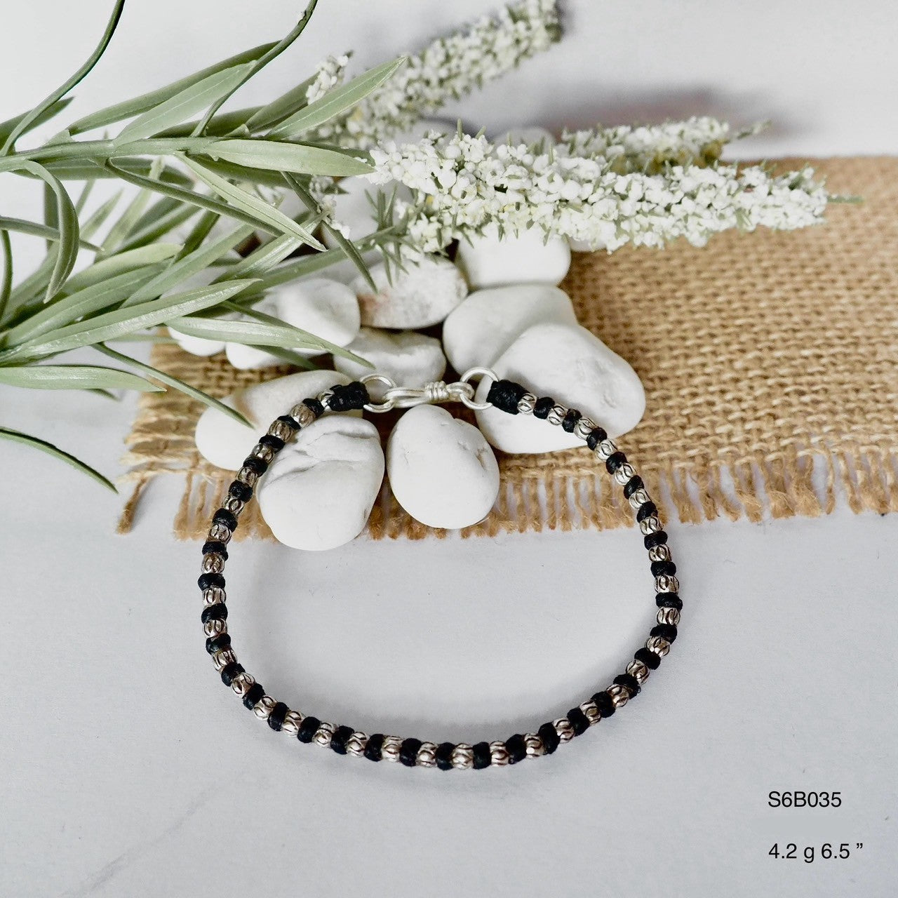 Instant classic. This silver bracelet never fades.