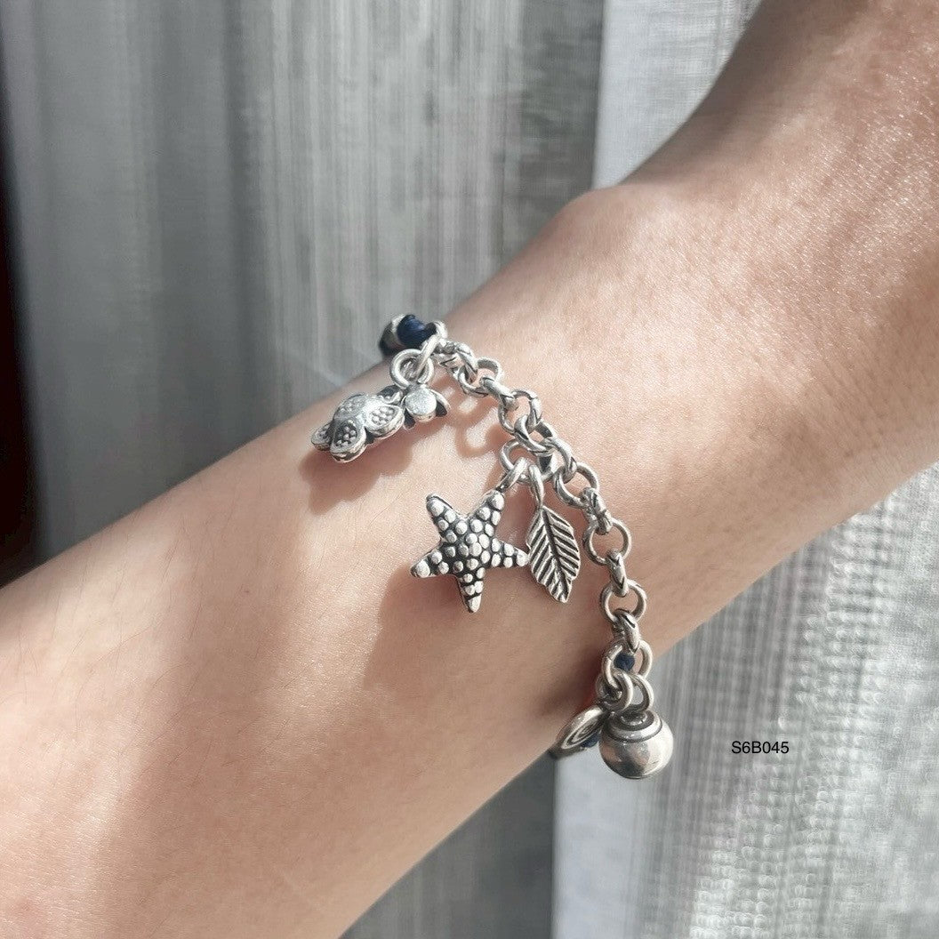 Find your signature silver bracelet.