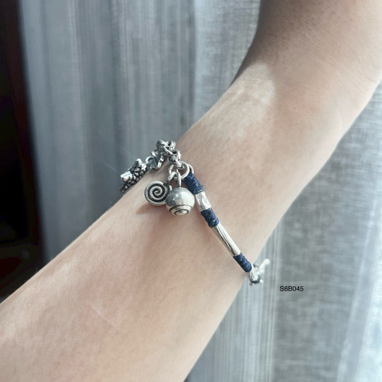 Find your signature silver bracelet.