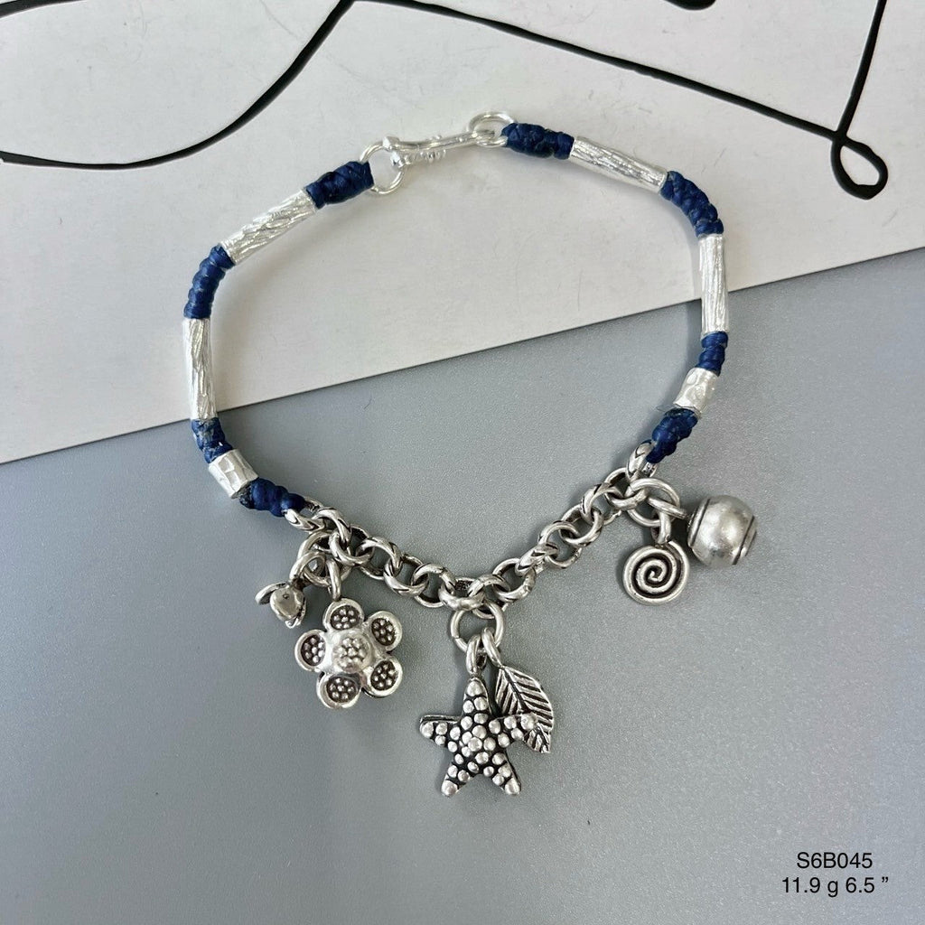 Find your signature silver bracelet.