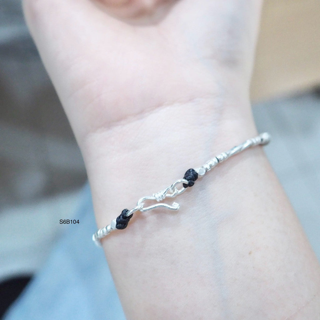 Positive energy woven into this bracelet.