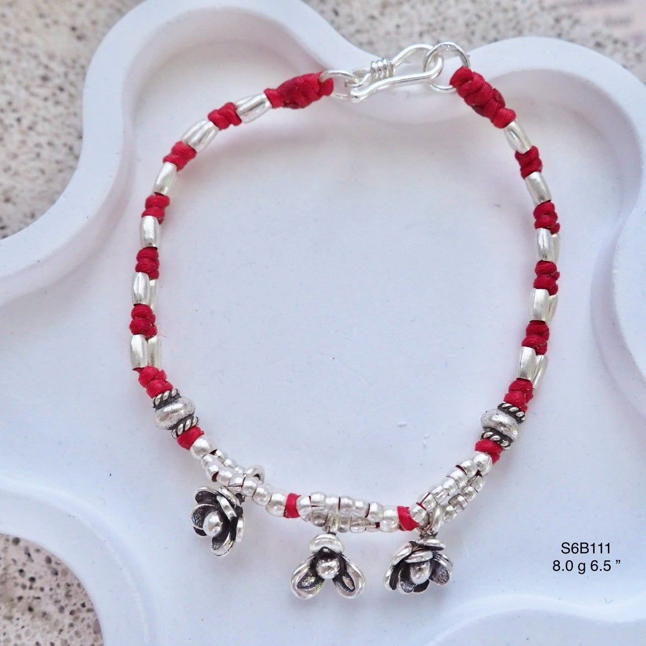 Features natural materials. Love this bracelet.