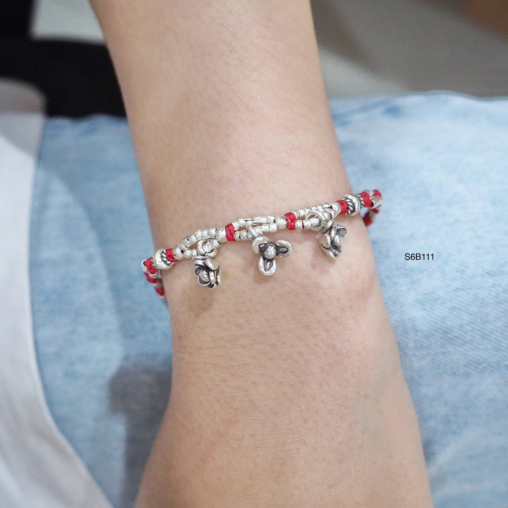 Features natural materials. Love this bracelet.