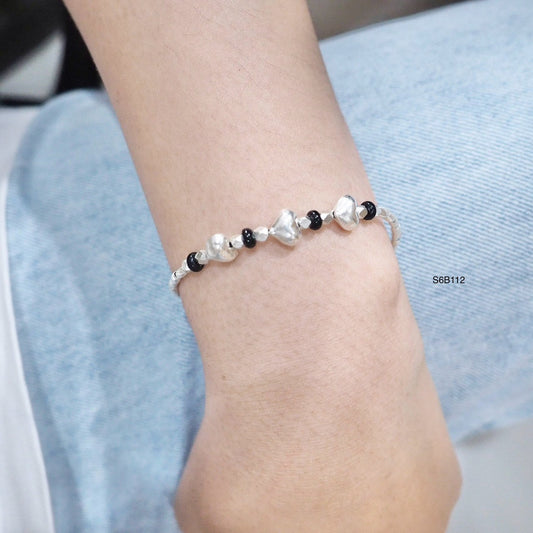A bracelet that transcends trends. Handmade.
