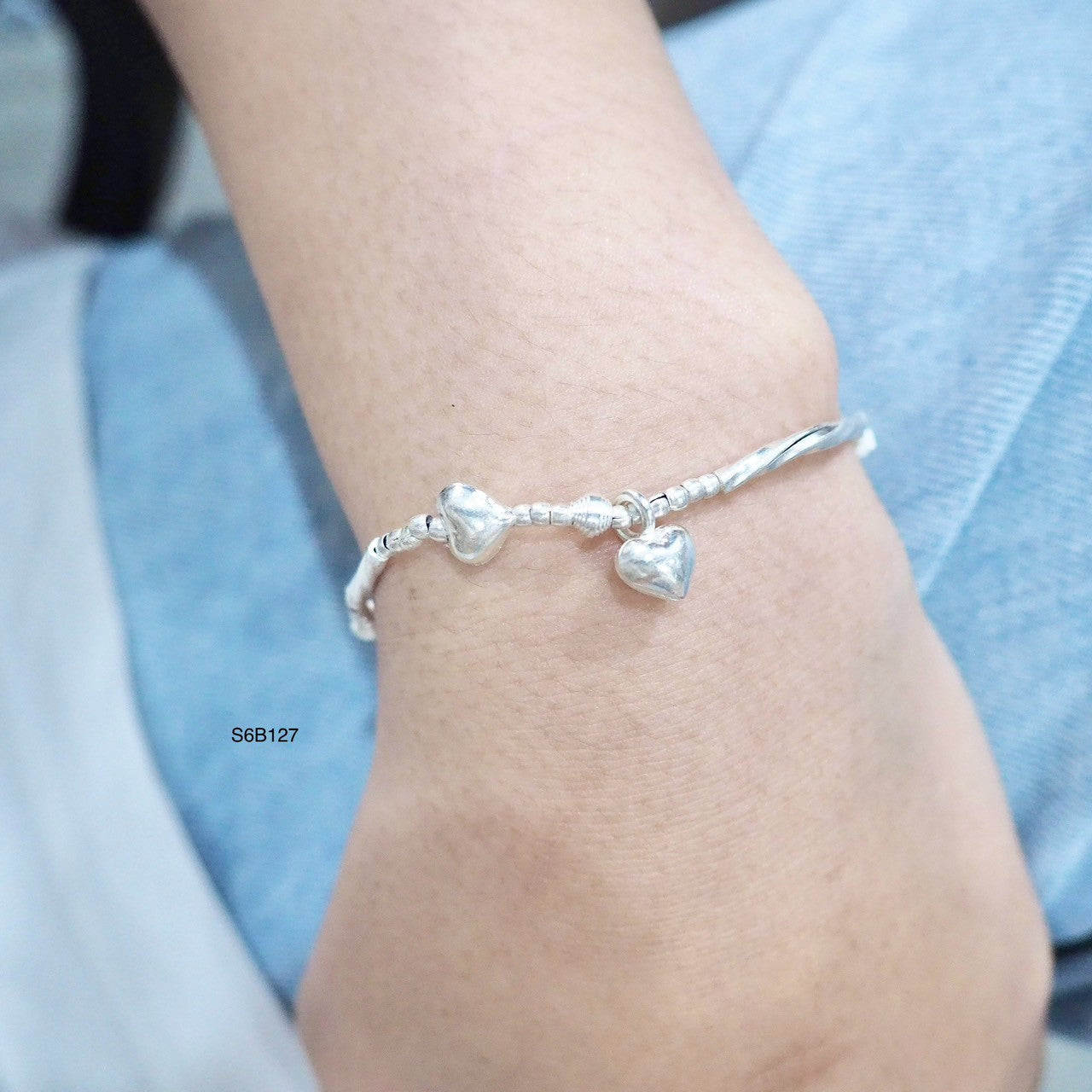 Catch the light with this sparkling silver bracelet.