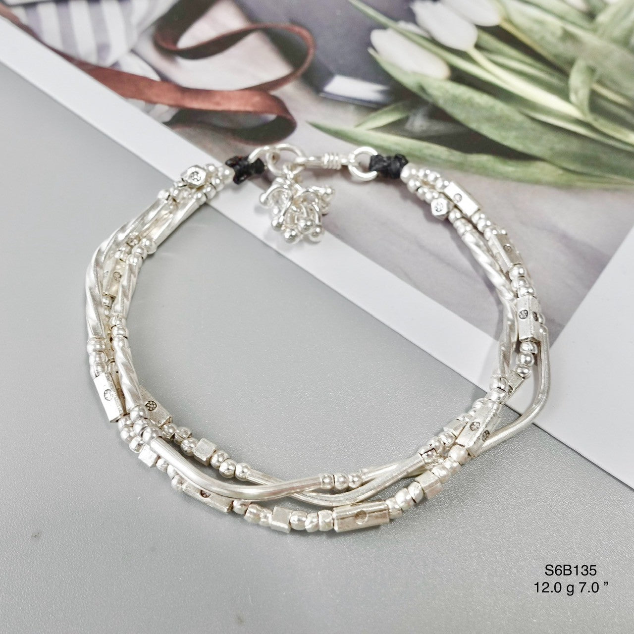 Every detail perfected in this silver bracelet.
