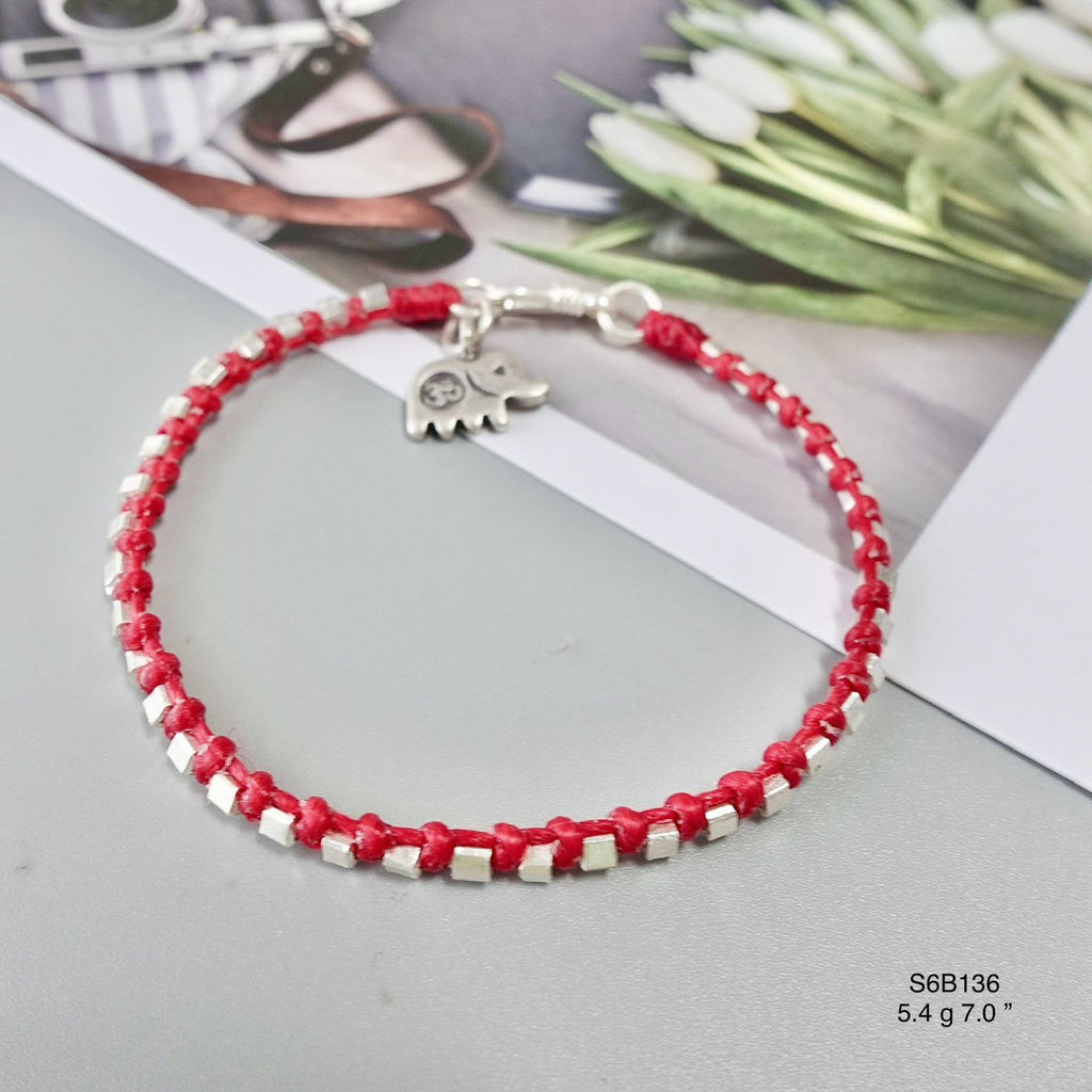 A handmade silver bracelet inspired by tradition.