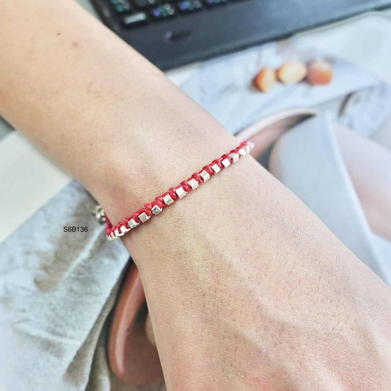 A handmade silver bracelet inspired by tradition.