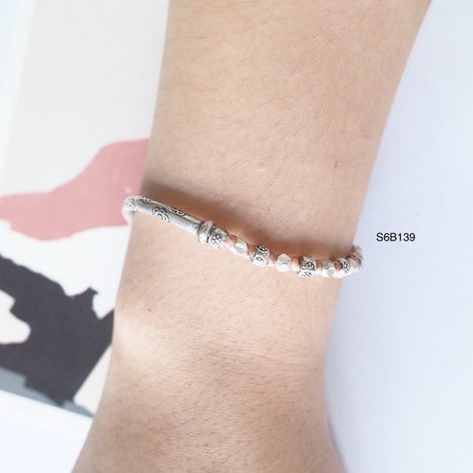 Unmatched beauty in this silver bracelet design.