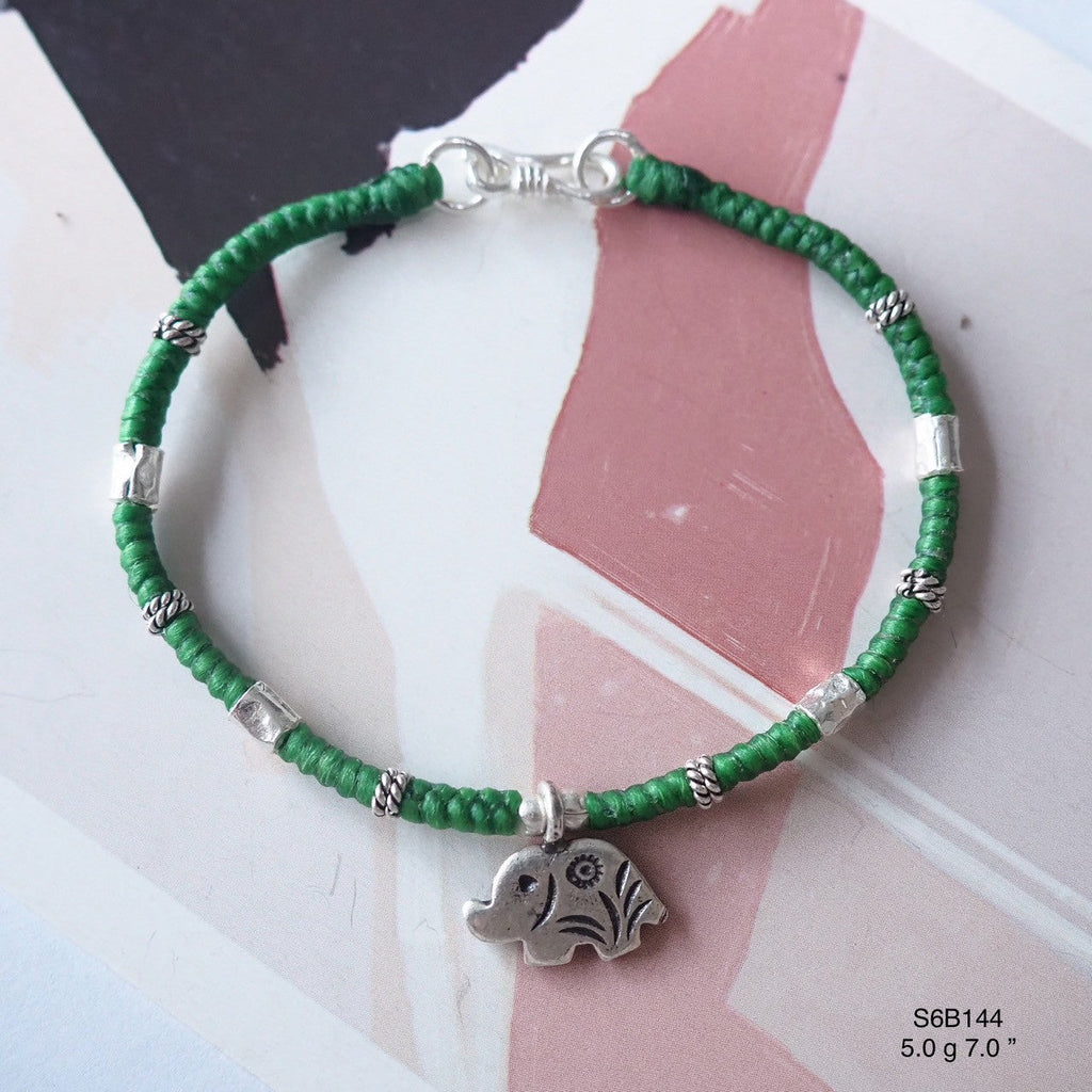 The detail on this silver bracelet is pure artistry.