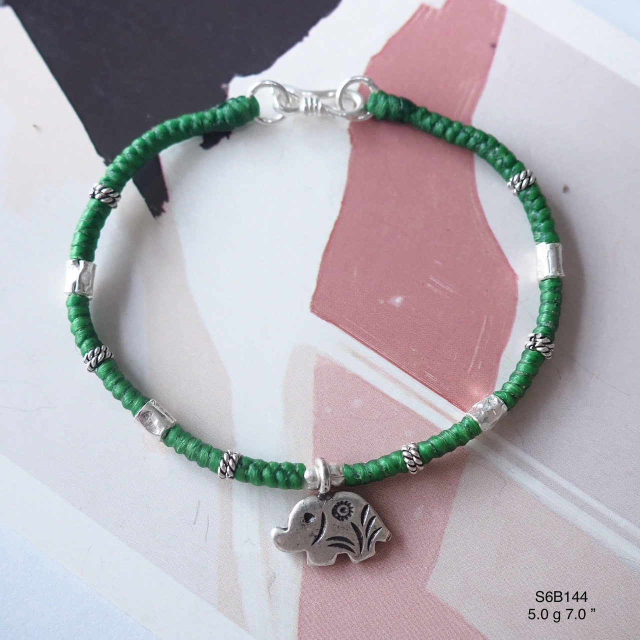 The detail on this silver bracelet is pure artistry.