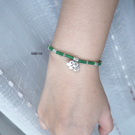 The detail on this silver bracelet is pure artistry.