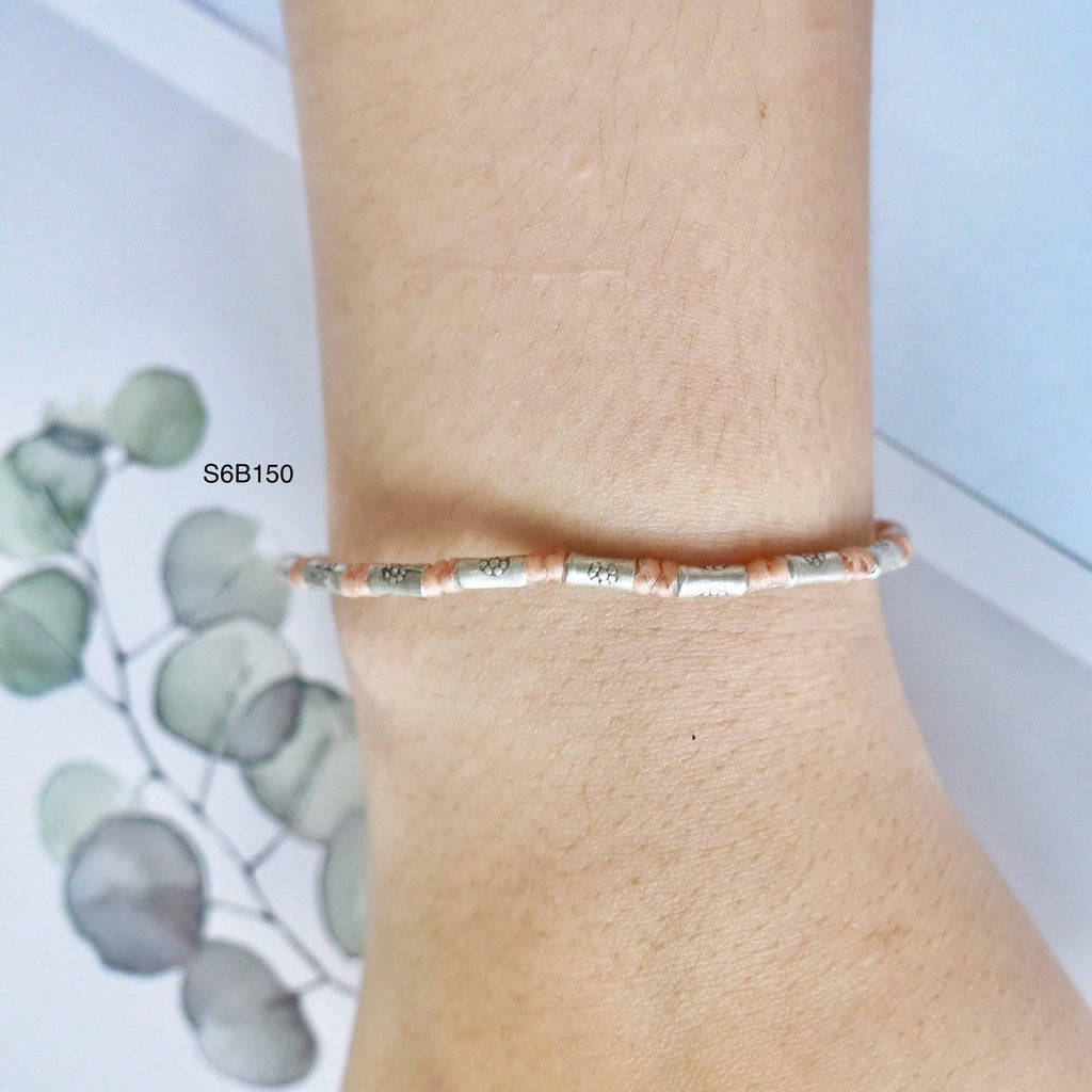 A truly thoughtful gift: a handmade silver bracelet.