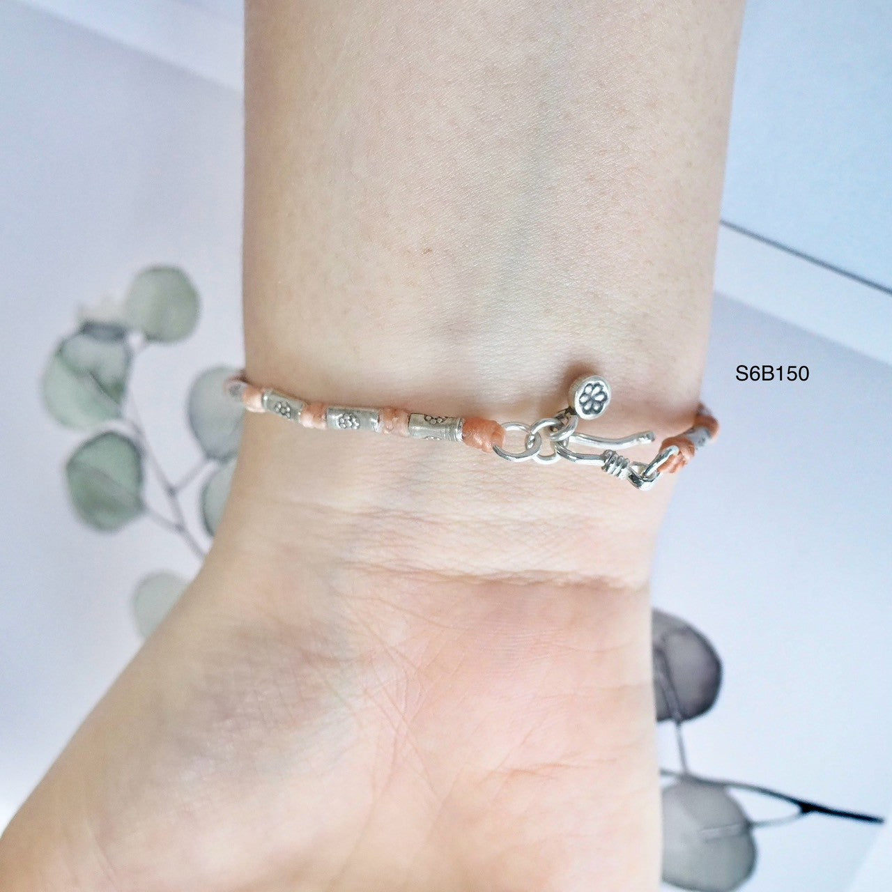 A truly thoughtful gift: a handmade silver bracelet.