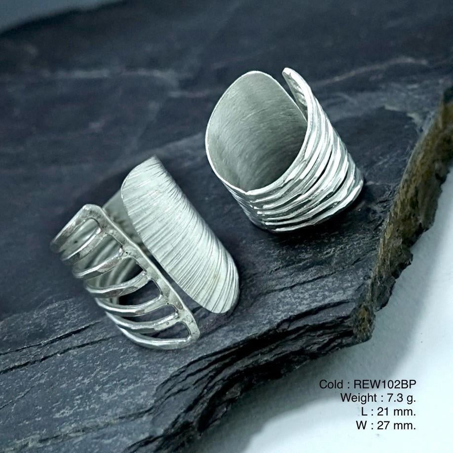 Limited edition silver ring drop.