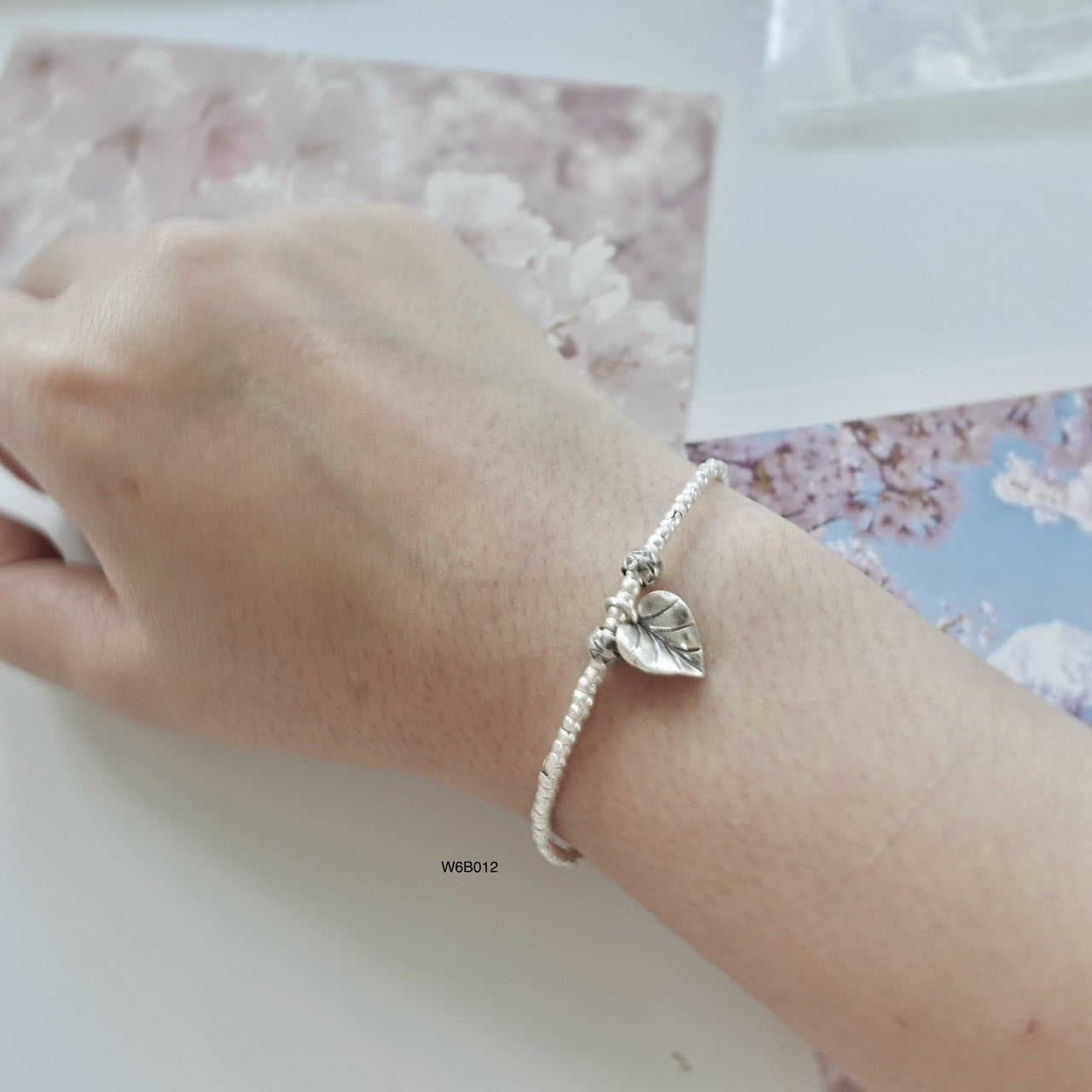 Simplicity meets sophistication — silver bracelet on exclusive sale.