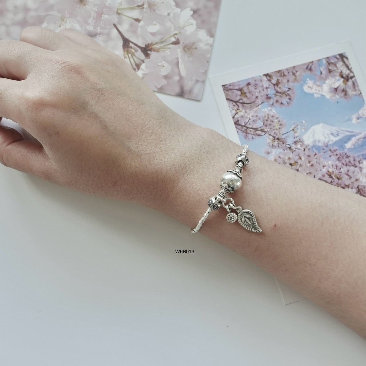 Minimalist luxury made accessible — silver bracelet, now discounted.