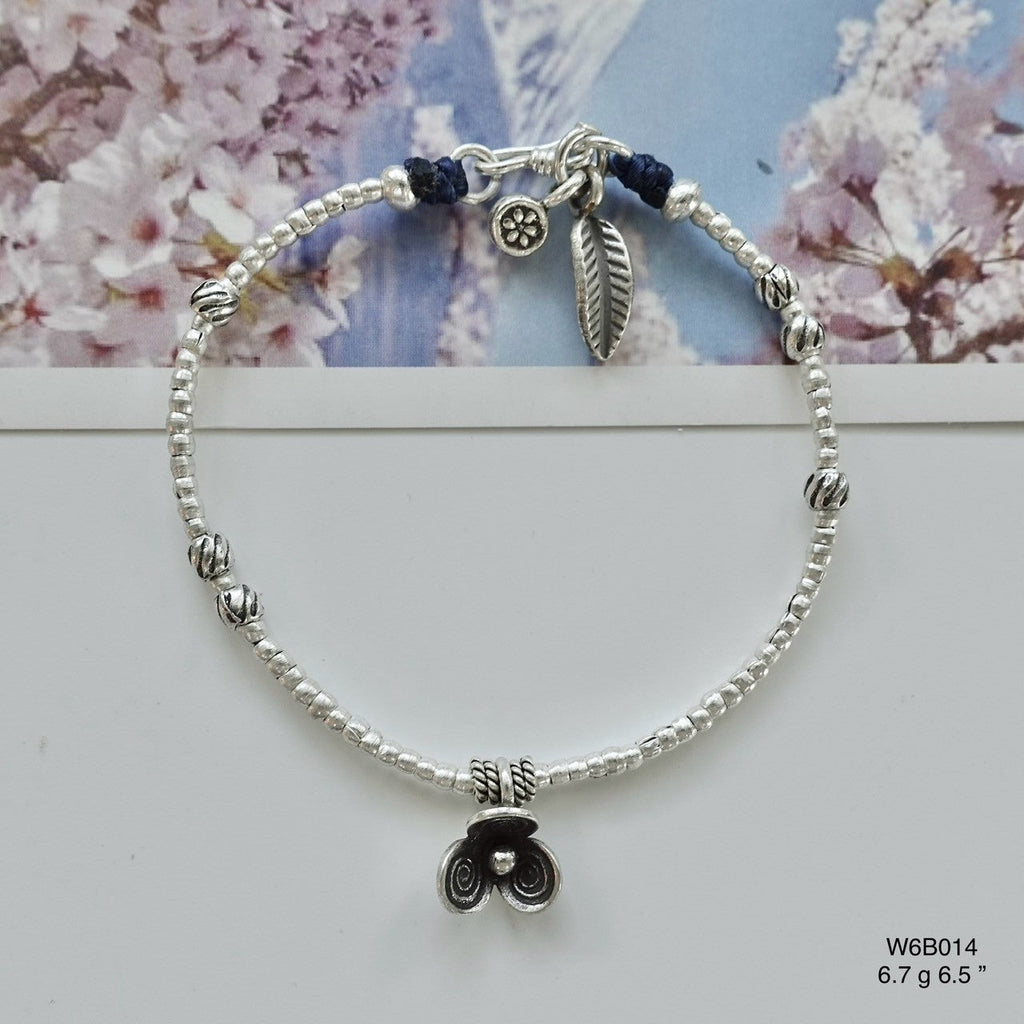Grace your wrist with a silver bracelet, now on limited-time offer.
