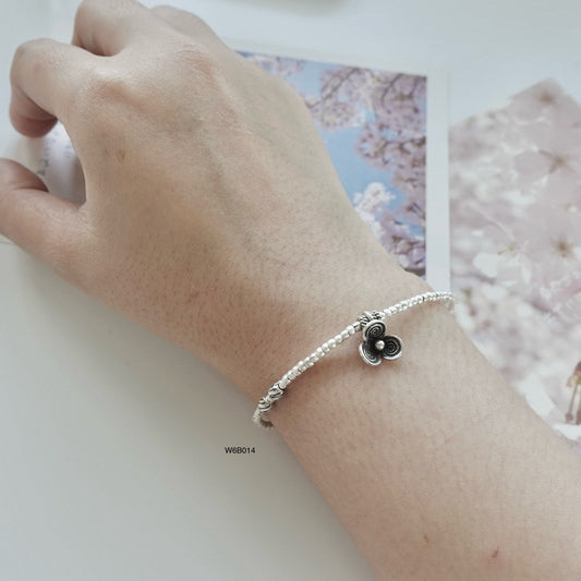 Grace your wrist with a silver bracelet, now on limited-time offer.