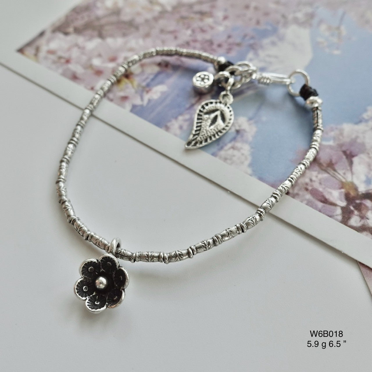 Add this must-have silver bracelet to your cart — it's on SALE!